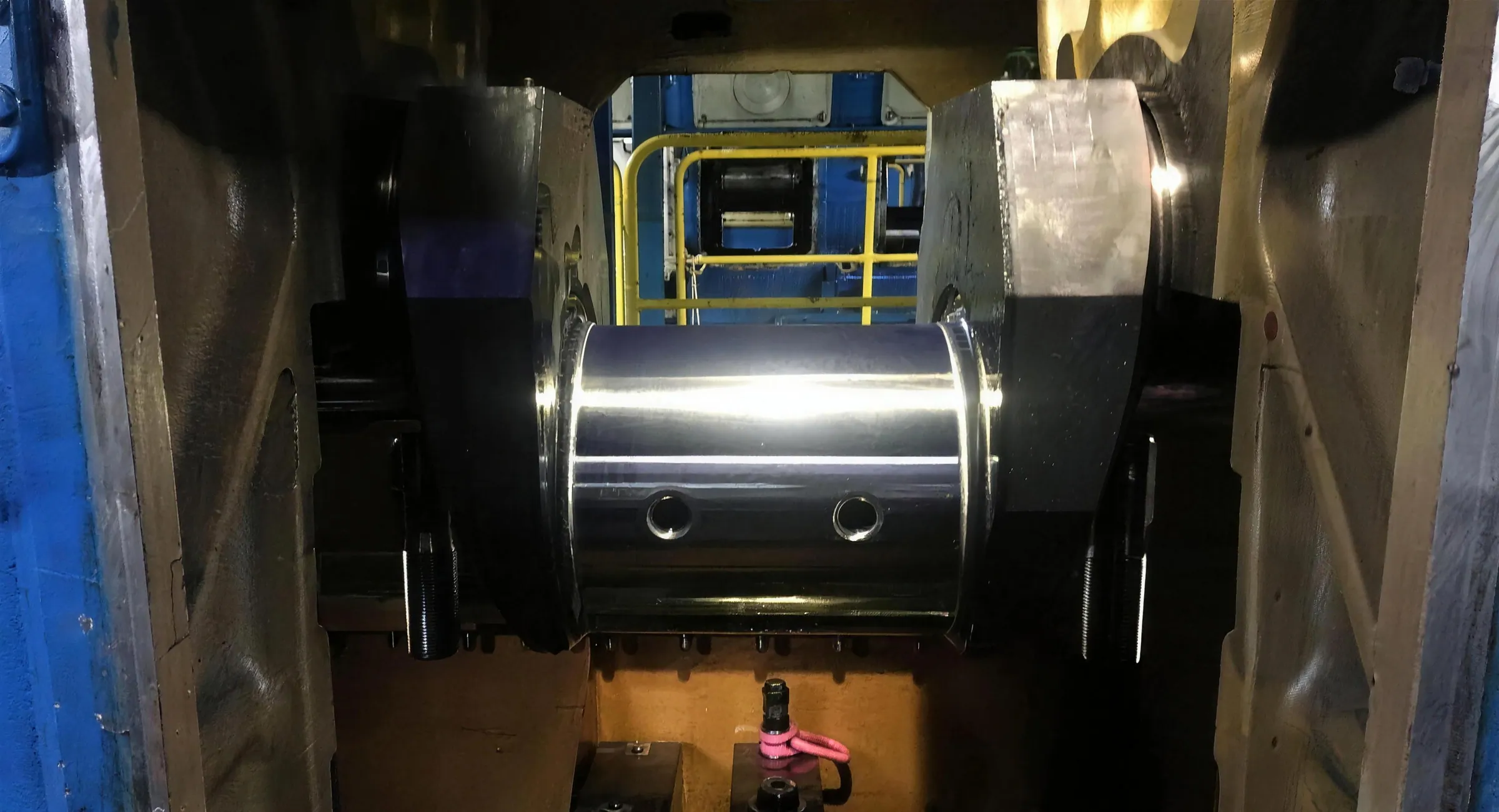 A machined crankshaft journal between two crank webs, seen inside the engine.